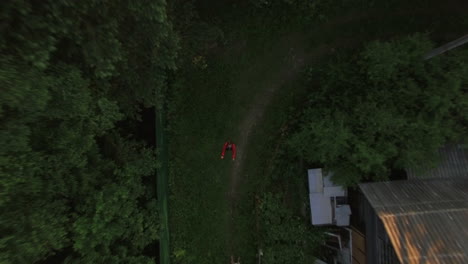 child catching descending drone
