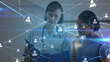 animation of network of connections with icons over diverse doctors in hospital