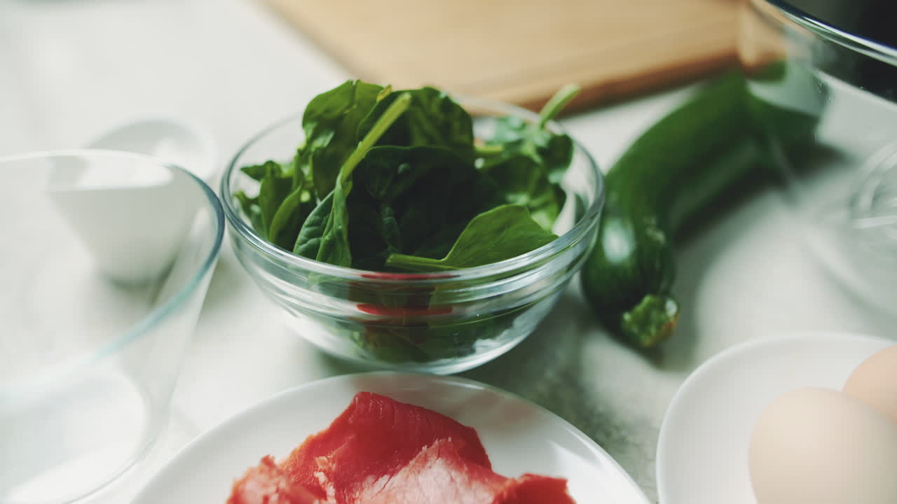 Close-Up of Salmon, Spinach, and Zucchini