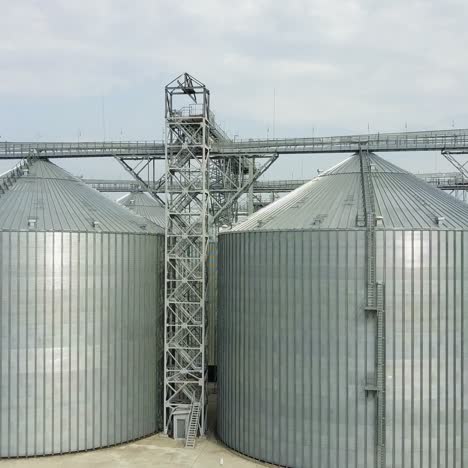 aerial view. plant for storage and processing of grain. metal grain elevator