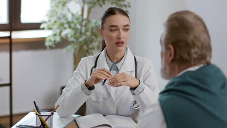 doctor discussing with senior patient