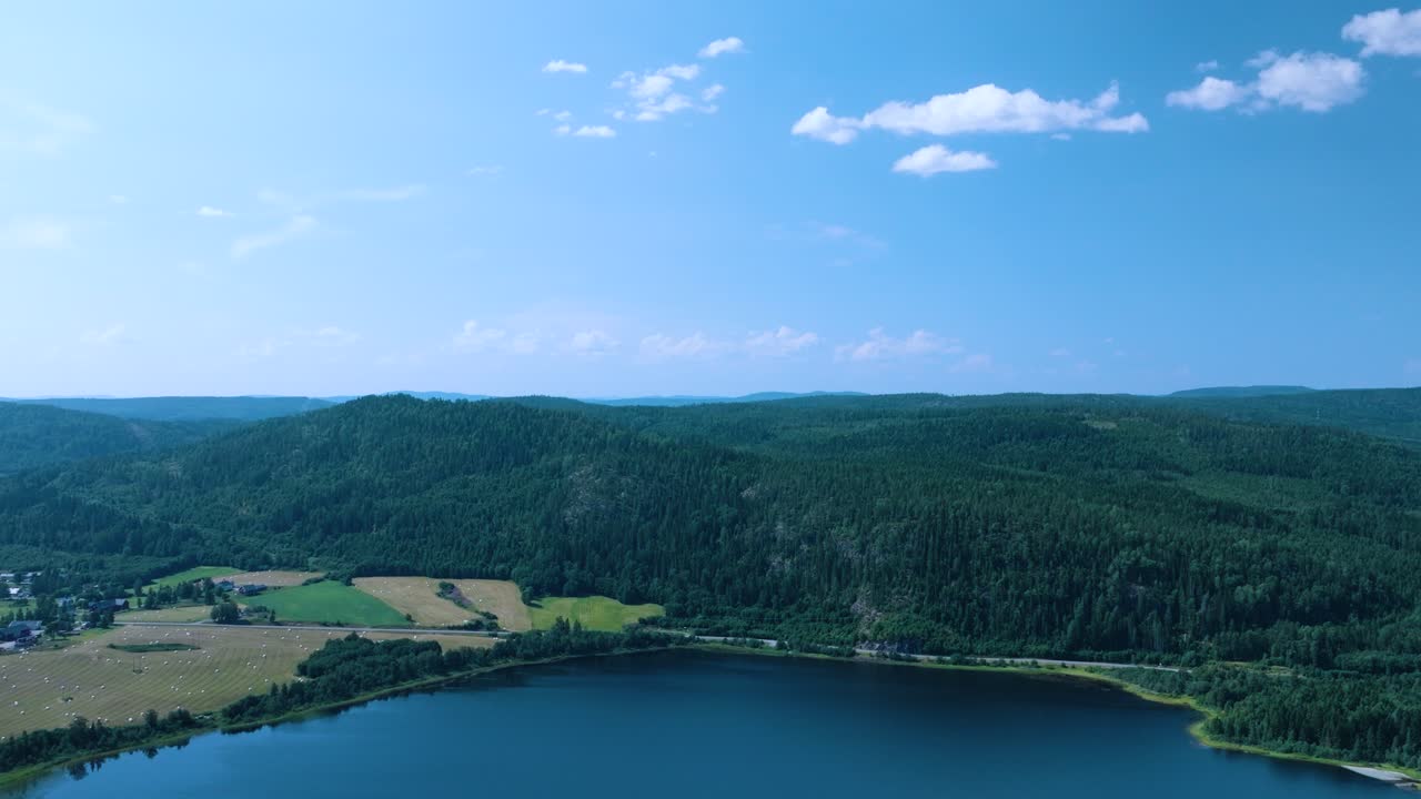 Höga kusten Skuleberget, drone push-in over trees and lake