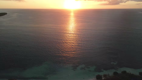 sunset in beautiful beach with golden hour skies.