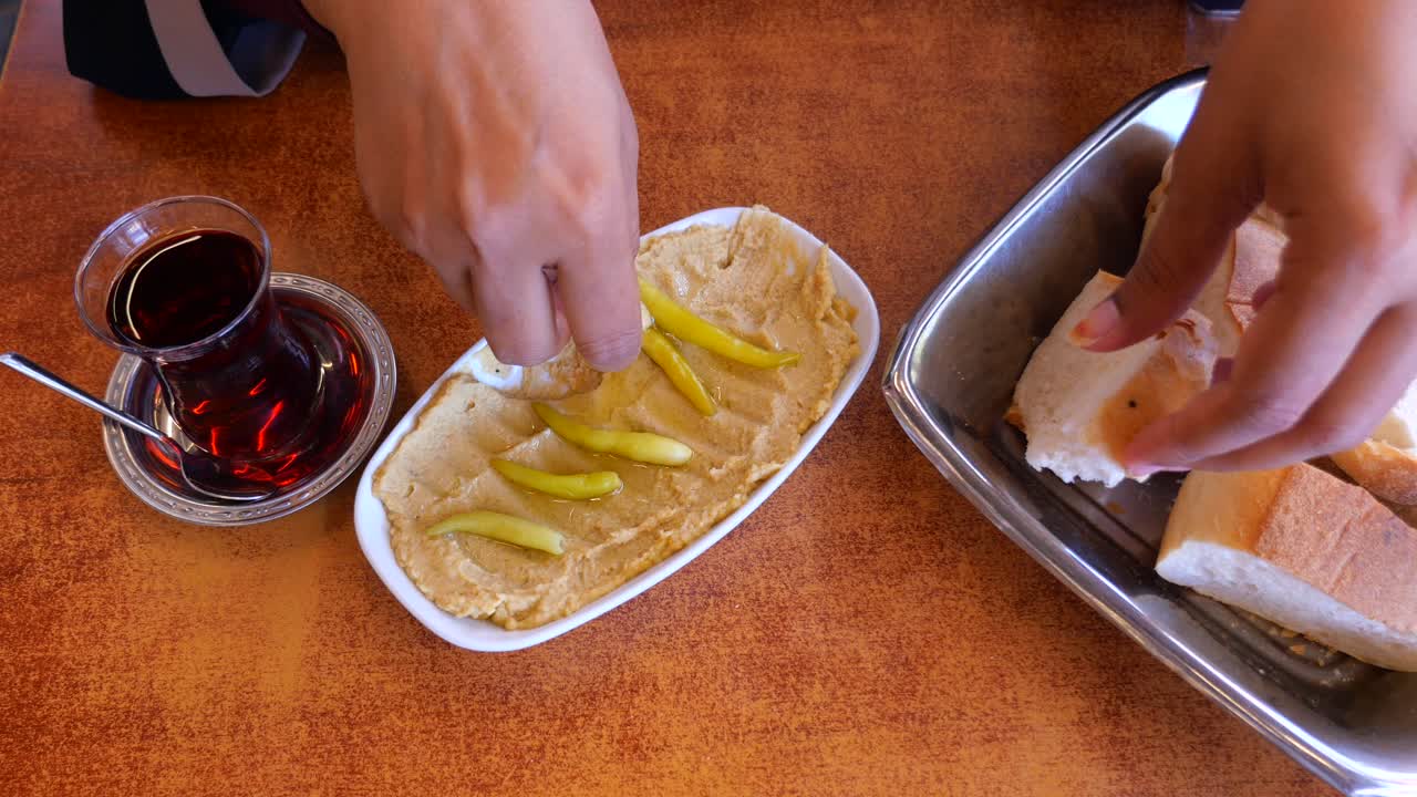 Hummus, bread, and Turkish tea