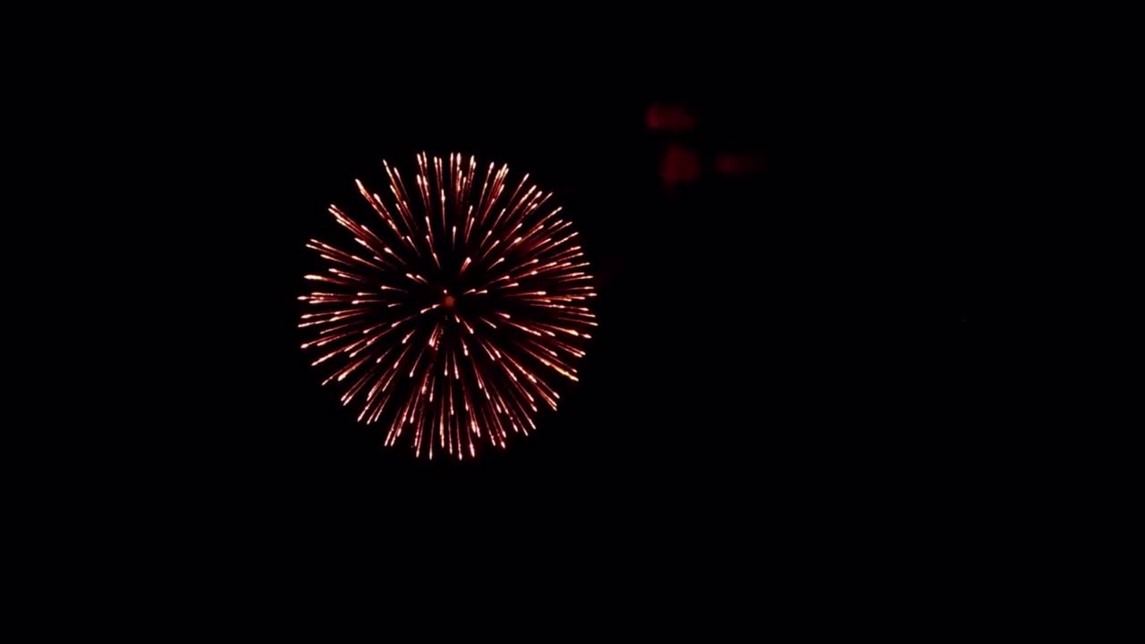 Realistic colorful firework isolate on black background for use as overlay.