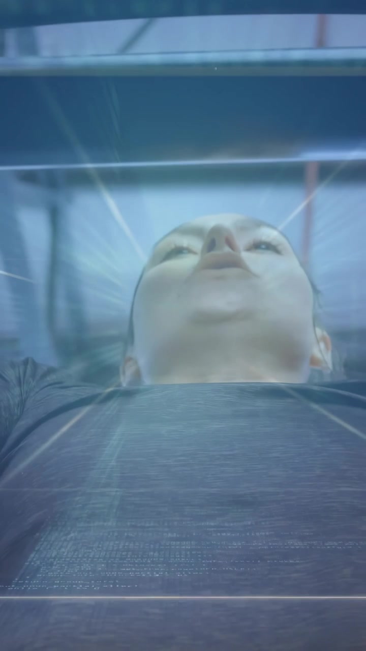 Vertical video: Woman inhaling under camera pulling up past rungs as scanline tracking for fitness