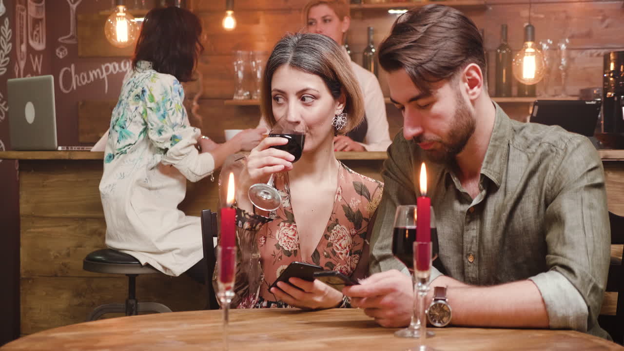 Couple enjoying a romantic date in a bar
