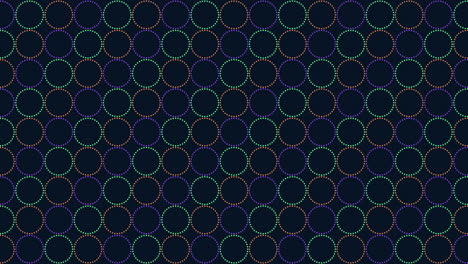 colorful circles connected in a circular pattern on a black background