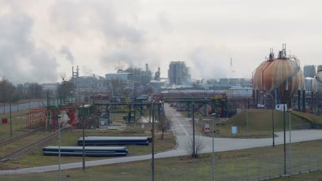 smoke, steam rises from wloclawek petrochemical plant, poland