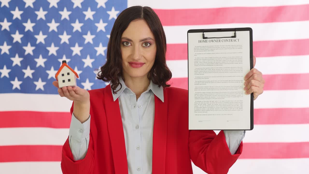 Woman Holding Homeowner Contract in Front of American Flag