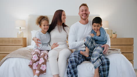 Face,-children-and-mother-and-father-in-bedroom