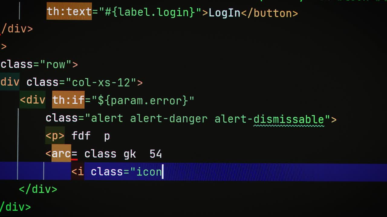 Close-up of a computer screen, with program code. A major project is being developed