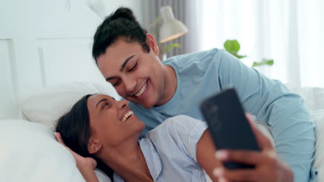 Selfie,-love-and-relax-with-couple-in-bedroom