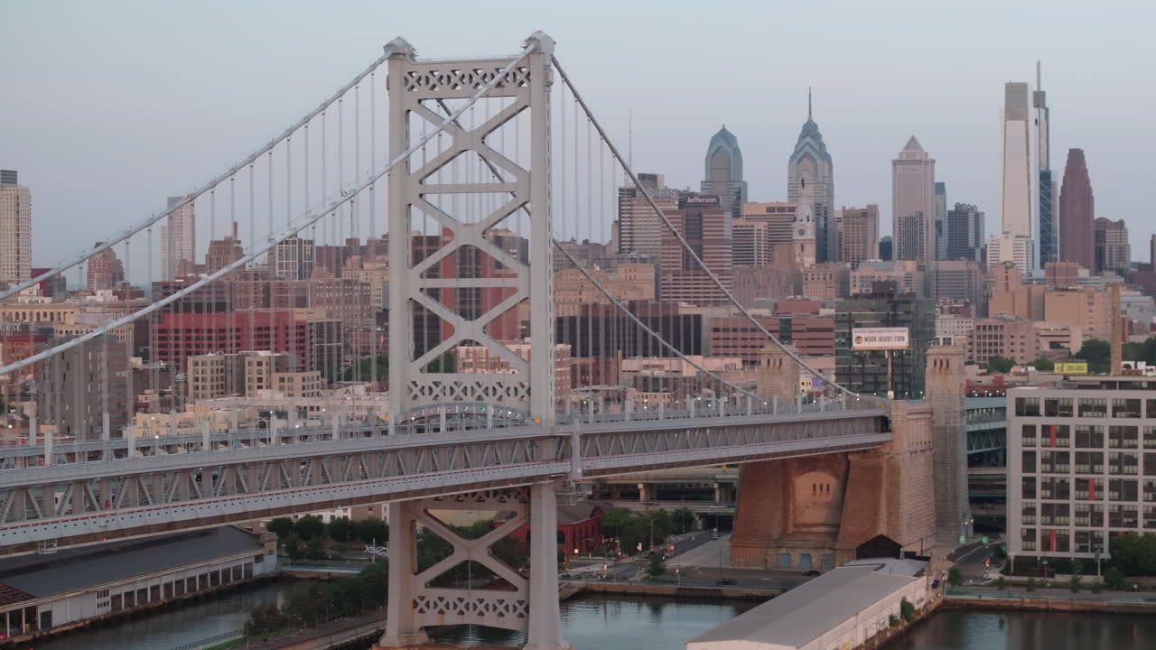Aerial view of Philadelphia's Ben Franklin Bridge. Shot along the Delaware River at sunrise on a summer morning