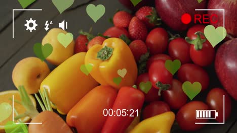 animation of heart icons over fruit and vegetables