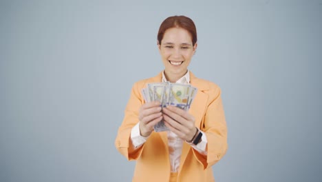 business woman counting money looking at camera.