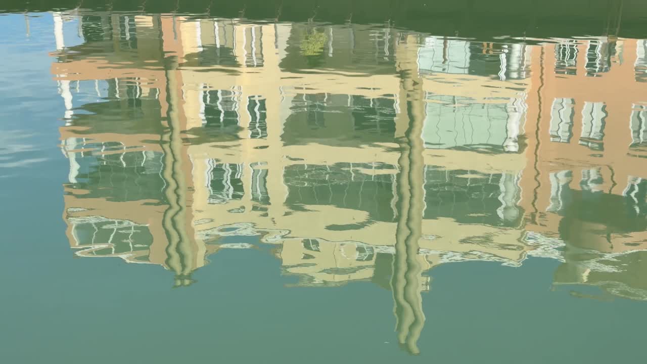 Reflection of buildings on the surface of the water