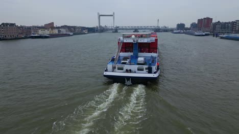 belicha cargo ship cruising near dordrecht city in netherlands