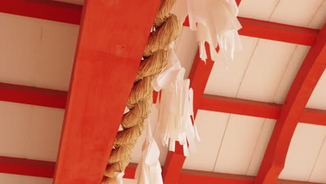 traditional japanese shrine details with rope and white paper streamers