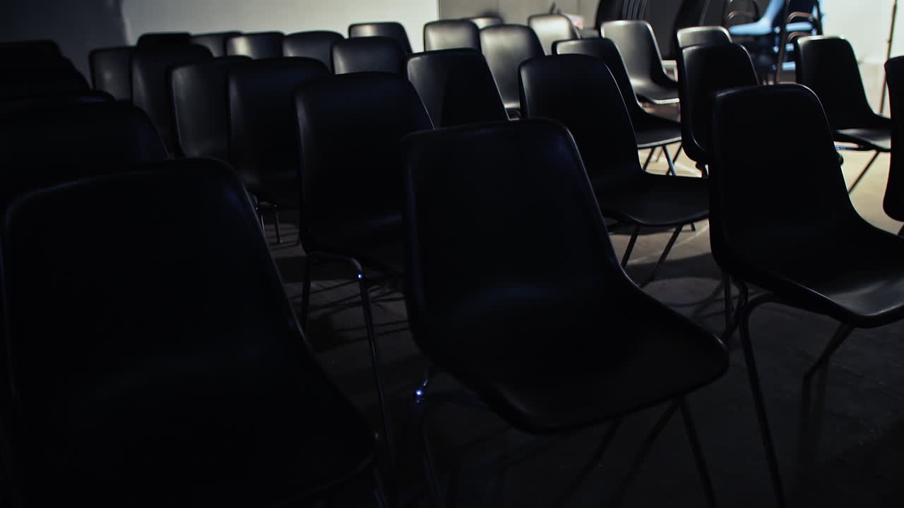 Empty seats in a small room for conference - shows