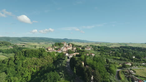 lorenzana, italy, showing the scenic countryside and small village surrounded by greenery, aerial view