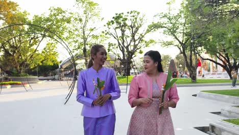 two women in thai traditional attire