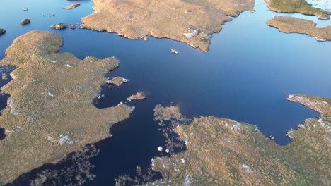 revealing aerial of connemara, a region of immense natural beauty in ireland, renowned for its abundance of rushing rivers, tranquil lakes, reflections of a pristine and unspoiled wilderness