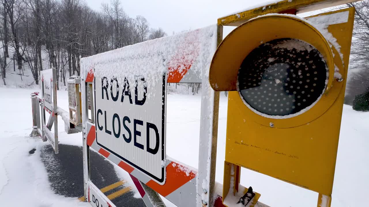 road blocked with blinking warning light along the blue ridge parkway near boone nc, north carolina