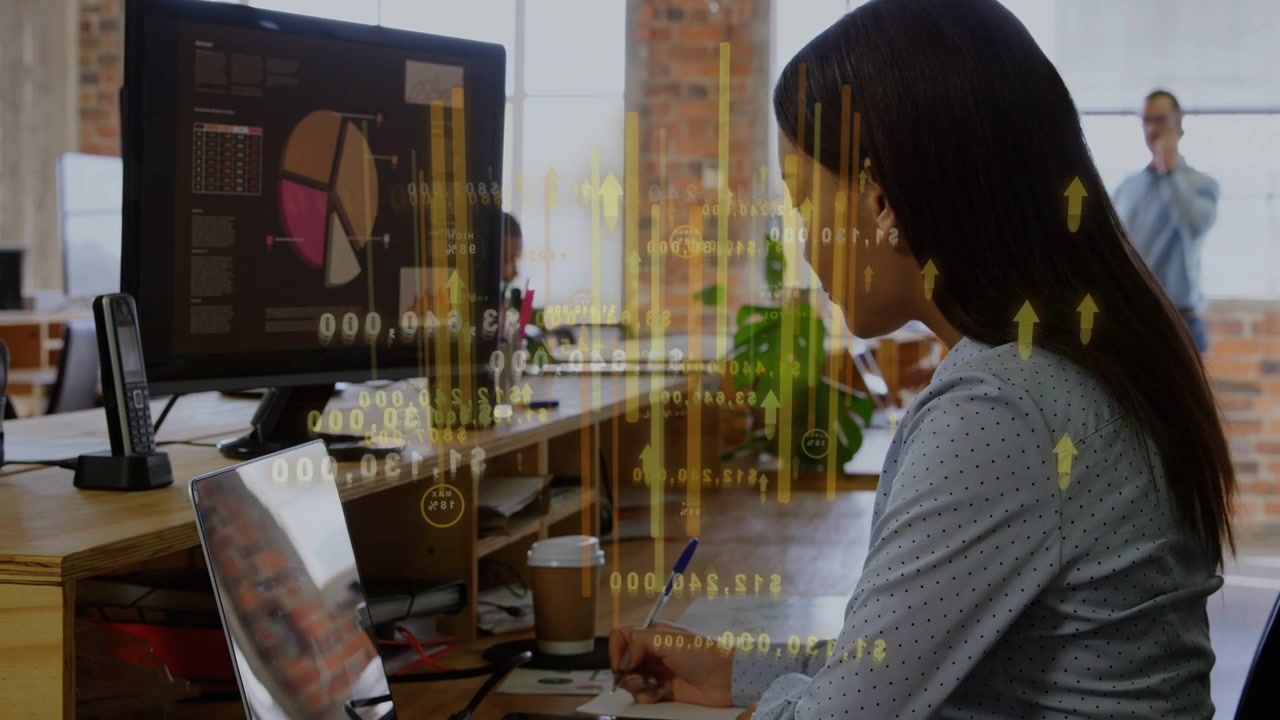 Woman watching monitor alert, typing and noting for business analysis, animated charts over desk