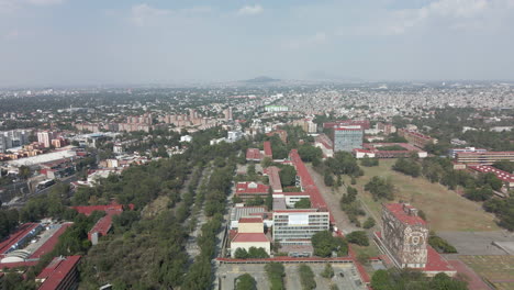 Backwards-view-of-UNAM-with-drone-in-mexico-city