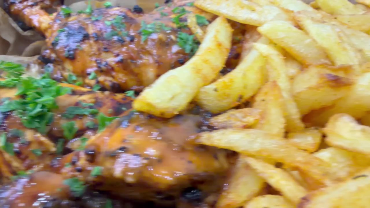 Peri Peri chicken with parsley and peri peri chips
