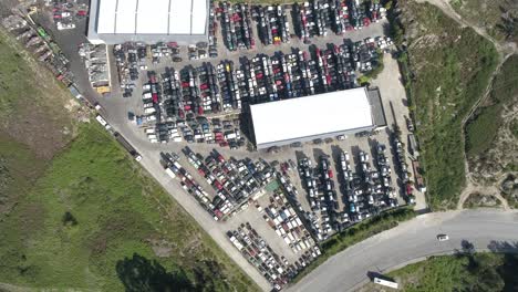 Aerial-view-of-a-junkyard-and-large-group-of-wrecked-cars