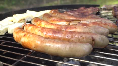 slow motion of tasty german sausages on barbecue grill in thuringia