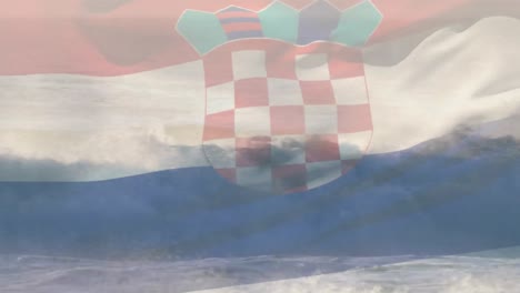 digital composition of waving croatia flag against waves in the sea