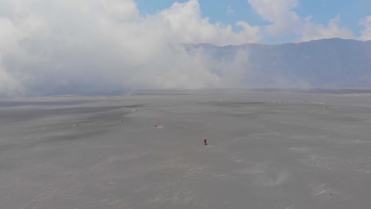 Dirt bike on Bromo's volcanic sand. Indonesia, East Java