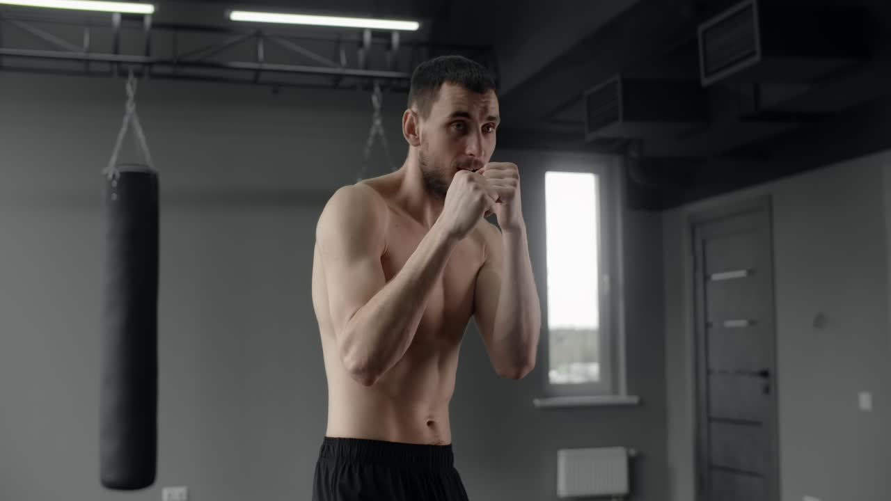 Man Boxing Workout in Gym