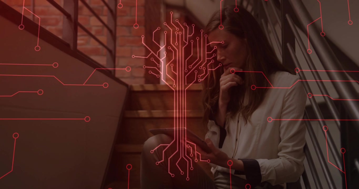 Woman tapping tablet screen on stairs studying tech network growth with glowing red circuit tree