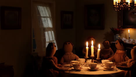 eerie dolls' tea party by candlelight