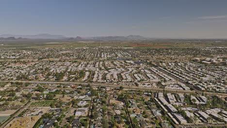 scottsdale arizona aerial v8 establishing drone flyover arizona canal across villa monterey residential neighborhood with desert and farmland in the background - shot with mavic 3 cine - february 2022