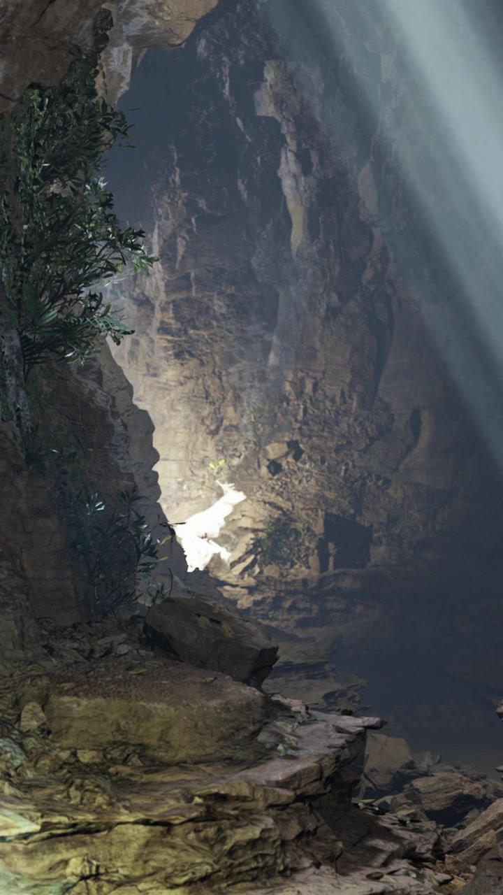 Exploring a cave with natural light shining through openings in the rock