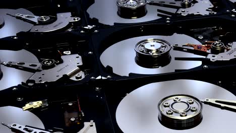 Closeup on opened Hard Disk Drives. Internals of Hard Disk Drives, sliding video