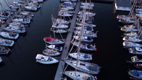 sailing boats, top view in marina, docked at the pier during the sunset 01