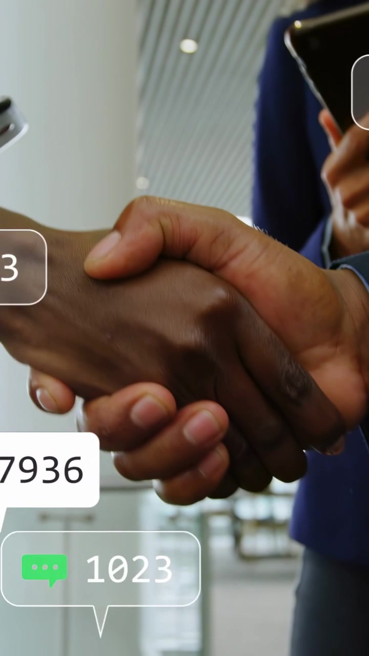 Handshake starting as two partners shaking hands, smartphone held, likes and counts rising for deal