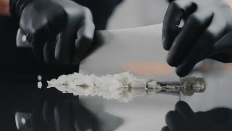 chef chopping white chocolate