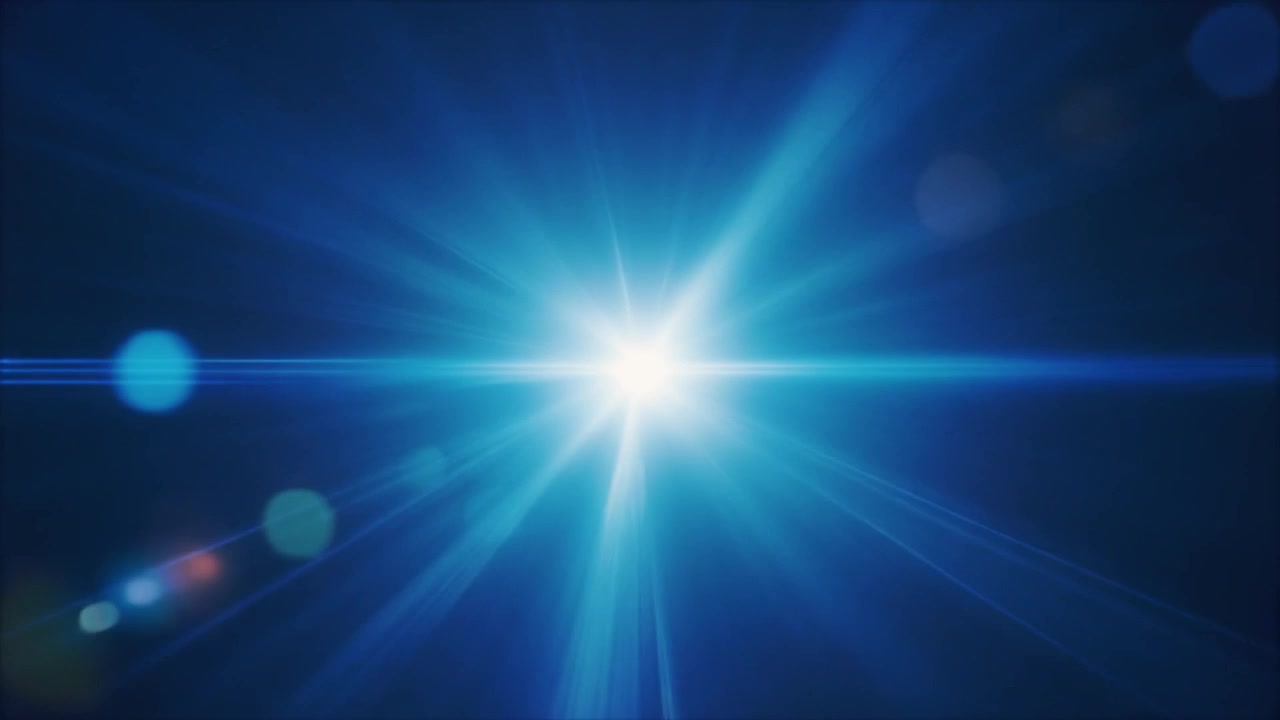 Klart blå linseflare med strålende lysstråler