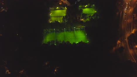night aerial view of multiple soccer fields