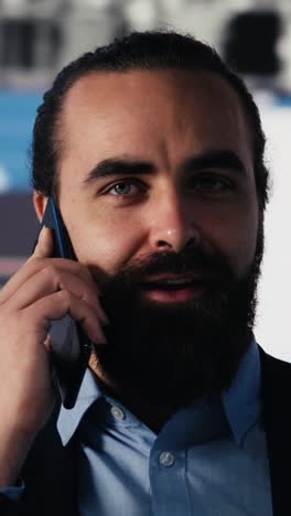 vertical video entrepreneur on a business call analyzing financial charts and kpi models