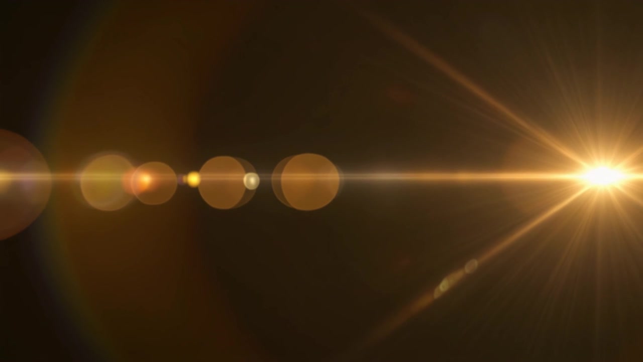 Effetto Flare Lente Dorato su Sfondo Scuro