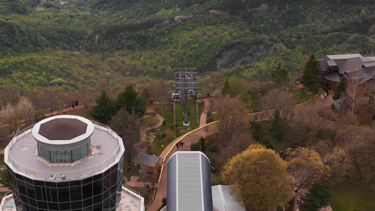 Aerial view of park and cable car in Tirana, Albania on a cloudy day