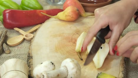 slicing pears on board